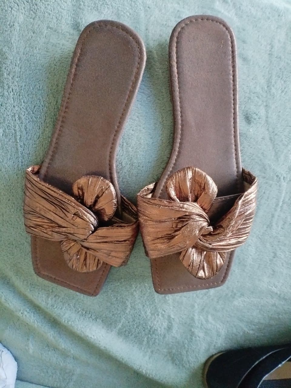 Bronze metallic knot flat slide sandals